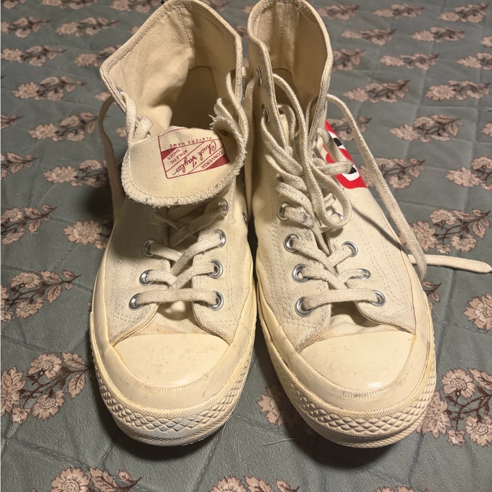 Converse Cream High Top Sneakers with Red Accent